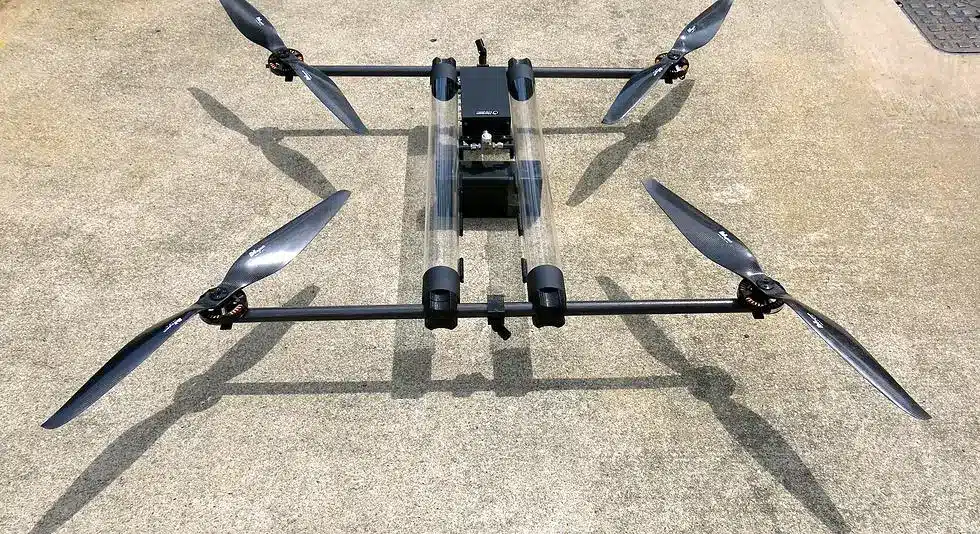 A view of a HLQ drone on a roady surface