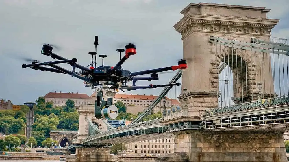 A view of a lidar drone hovering by the chain bridge in budapest