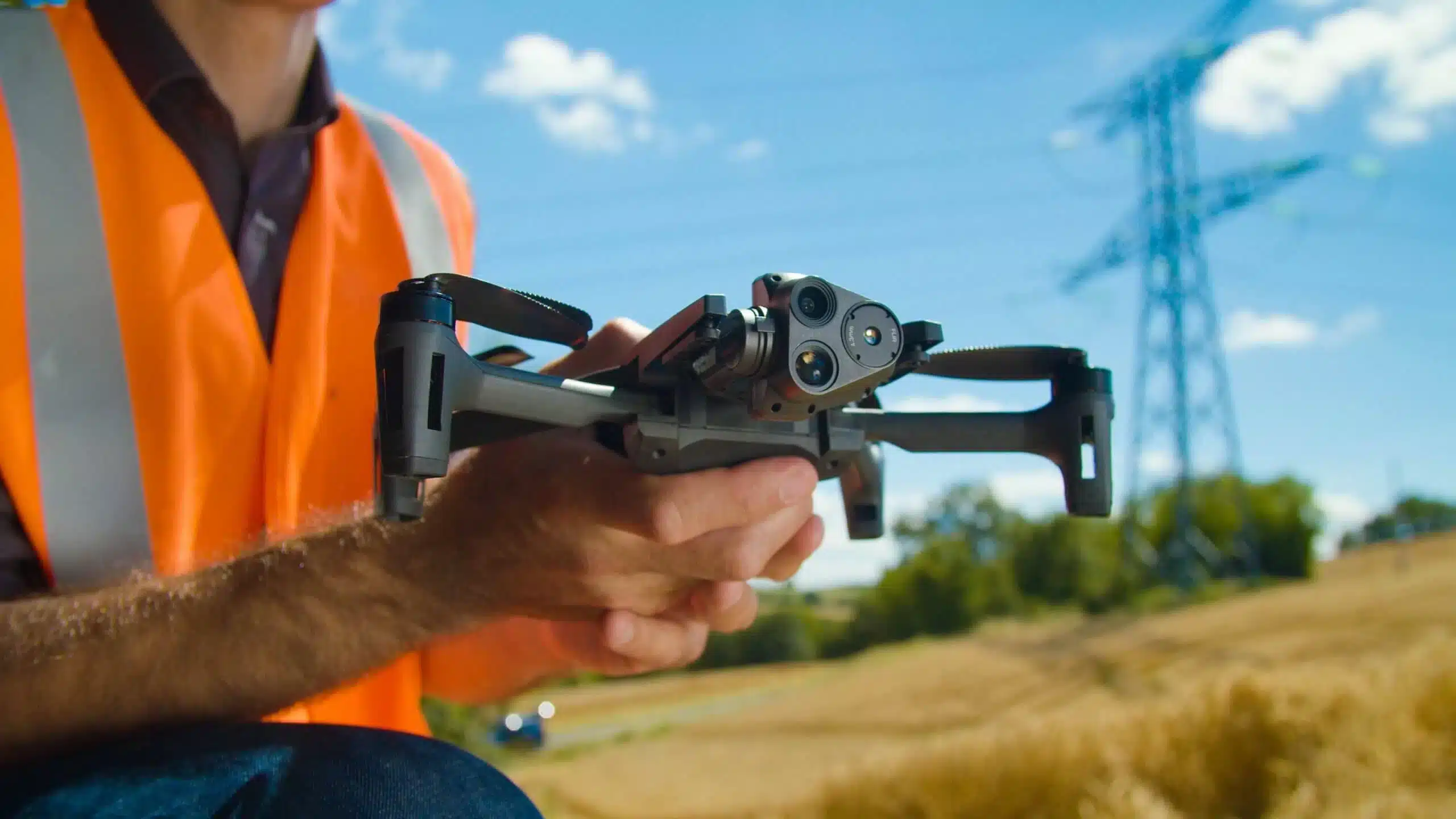 a rescue person holding a drone