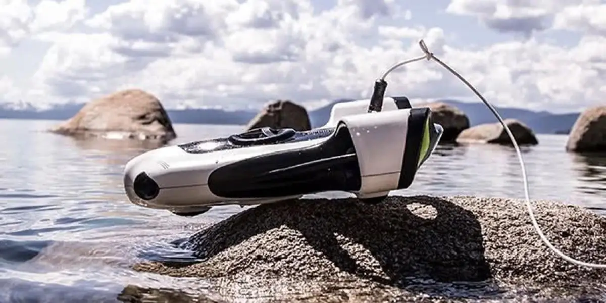 Underwater Drone placed on a stone at the beach