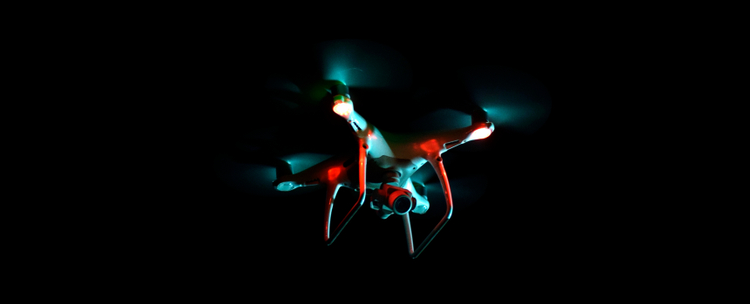 a drone flying in night time