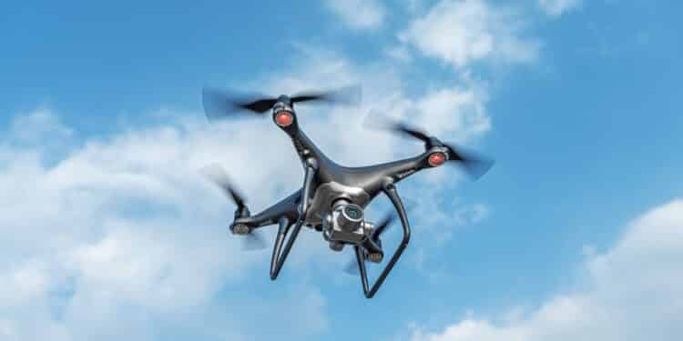 A Black Modern Drone With A Camera Flies In The
