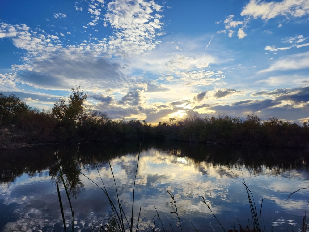 Reflection Of The Sky Bouncing Off The Water Of A