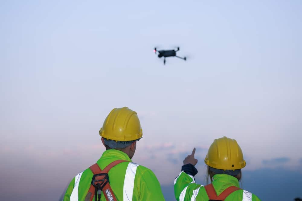 Engineer Team Remote Control Drone Survey And Inspect Of Hight